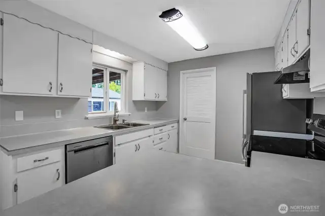Ample cabinet and counter space.