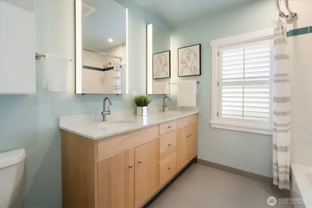 Remodeled full bathroom with 2 vanities on main level 2024