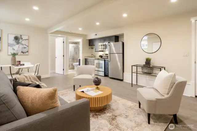 Accessible basement living space just off attached garage with extra storage perfect for potential family, guest, nanny or AirBnB