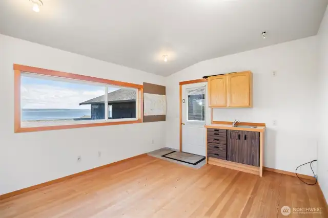 The office has a sink for a coffee bar, or can be a wet bar if you prefer.