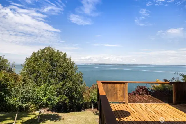Looking at the view from the deck off the living dining area toward Lummi Bay.