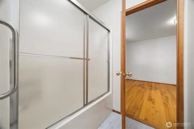 The full bath with the tub and toilet, as each bedroom on the main floor has their vanity in each bedroom.