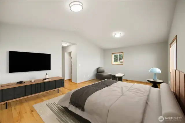 The primary bedroom is very spacious and has a large walk through closet.