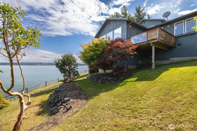 The covered front deck is ideal for grilling and barbequing even in inclimate weather.