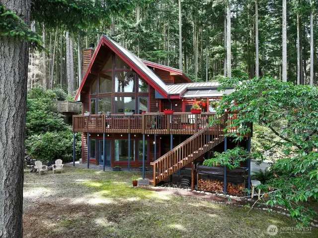 Welcome to your own island sanctuary! Three levels of light filled living with an abundance of windows. This is the eastern side of your home. Join us for an open house Saturday, 8/23 from 1pm - 3 pm.