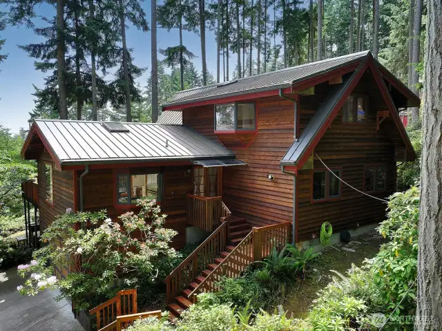 The western side of your home. The 15 acre sculpture forest park (Price Sculpture Park) borders your land.