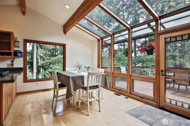 Dining-Atrium leads to your expansive deck. Check out that huge window that looks out over the drive into your home.