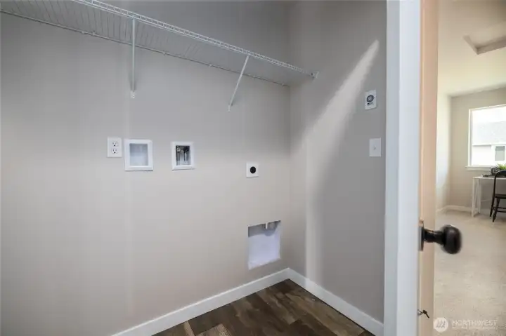 Upstairs utility close to all the bedrooms where the laundry is!