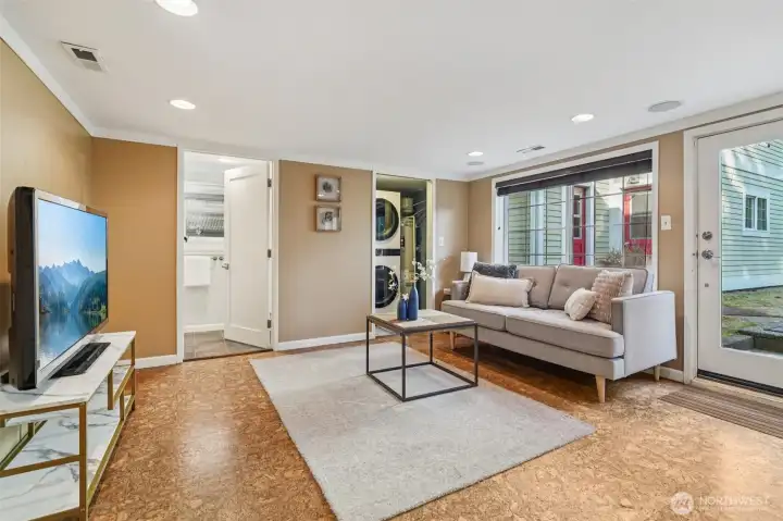 Lower family room with near level walk-out to backyard and fully finished outbuilding