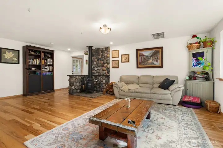 So much flexible space with gorgeous hickory floors!