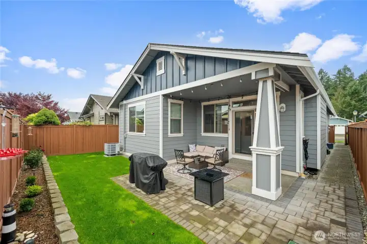 Enhance your living area with this large patio with covered space.