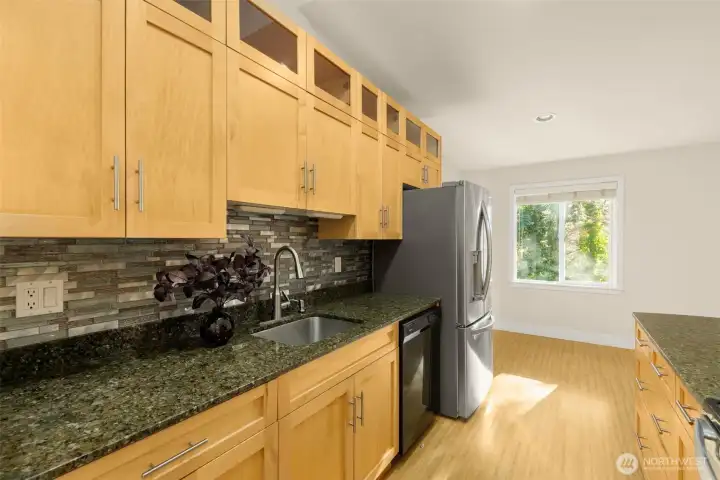 Gorgeous mosaic glass tile backsplash