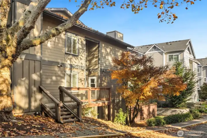 Quick access through convenient side entry, which leads directly to side stairs, unit is first door on left.