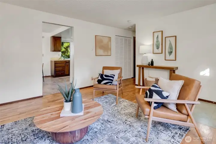 The living room leads to either the 3 bedrooms and the full bath or the kitchen, family room and back deck.  Choose your own adventure!