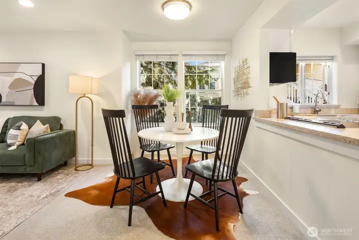 Dining space with S-facing large windows bringing in natural light