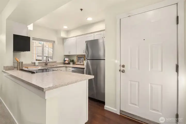 Beautifully updated kitchen to your right when you walk in.