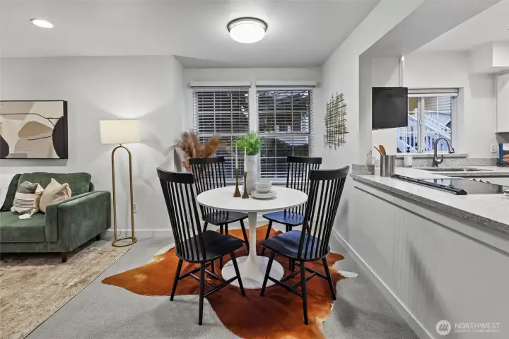 Dining space with S-facing large windows bringing in natural light