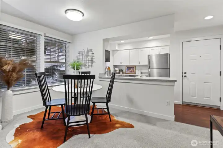 Dining space with S-facing large windows bringing in natural light