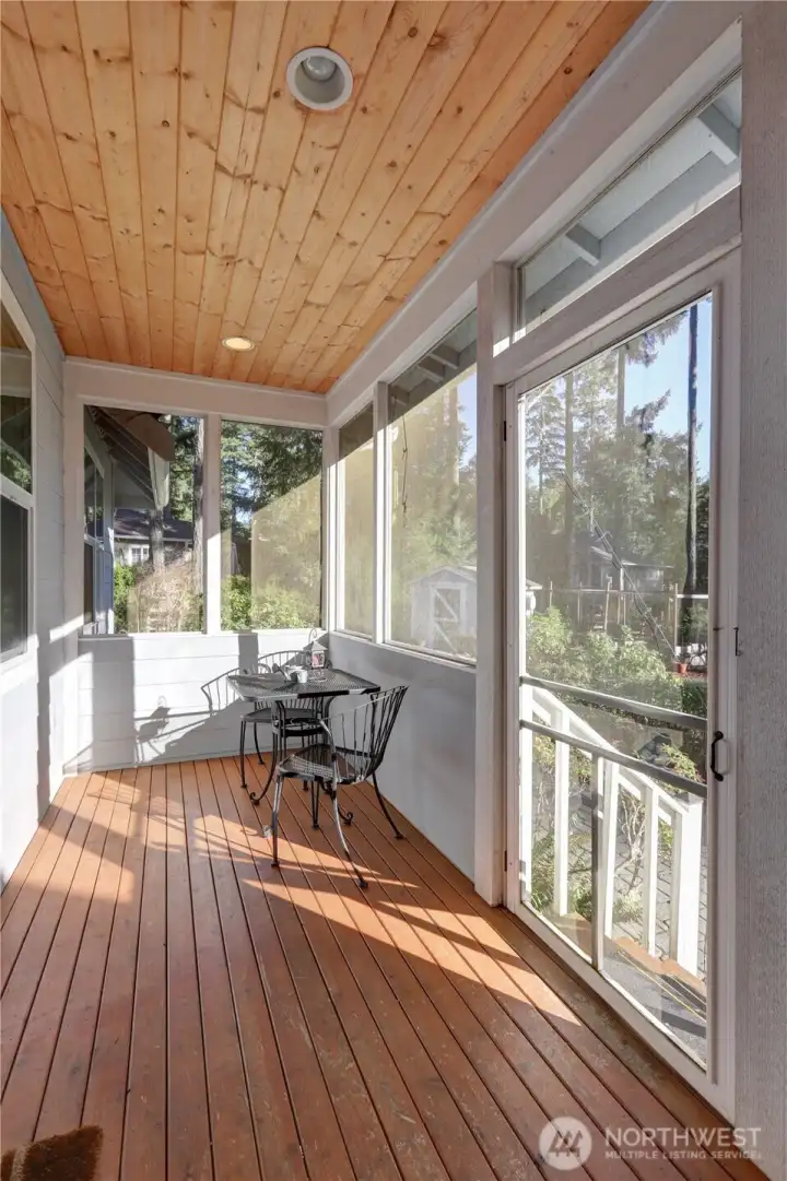 Sun Room off the Great Room Overlooks the Rear Naturescape.