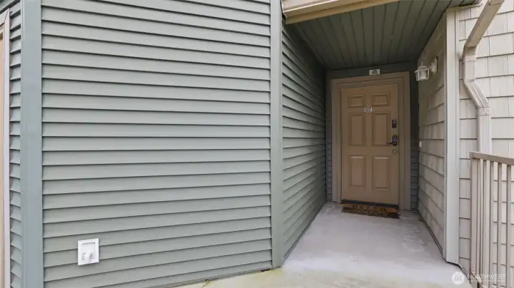 A cozy, tucked-away front entrance creates a warm first impression from the moment you arrive.