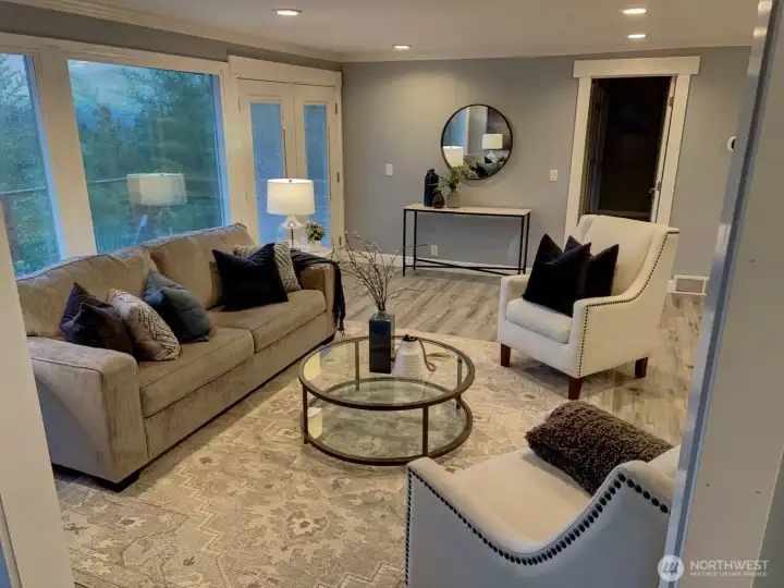 View of living room from piano room.