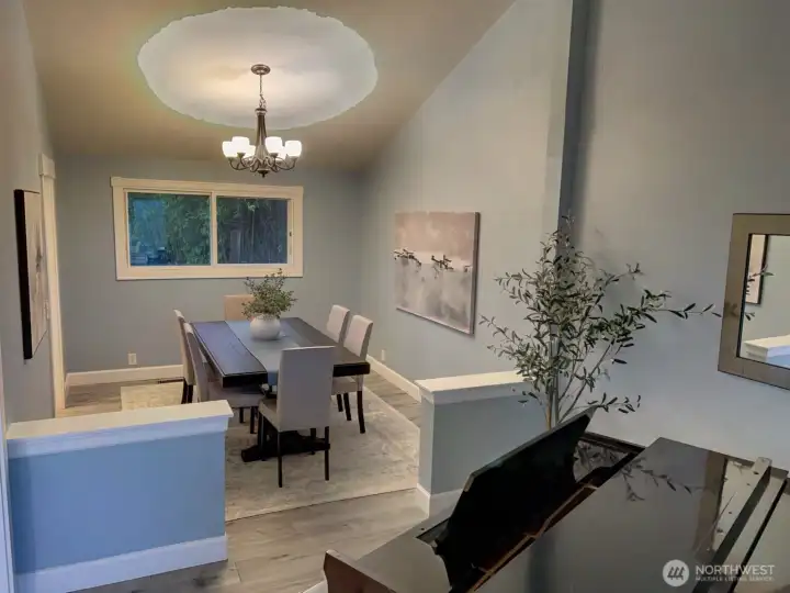 View of dining room from piano room. View of dining room from piano room.