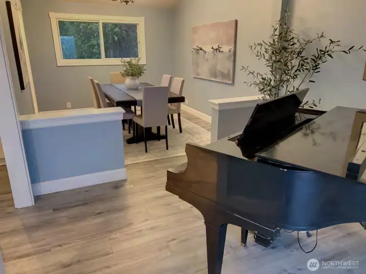 Piano and dining room.