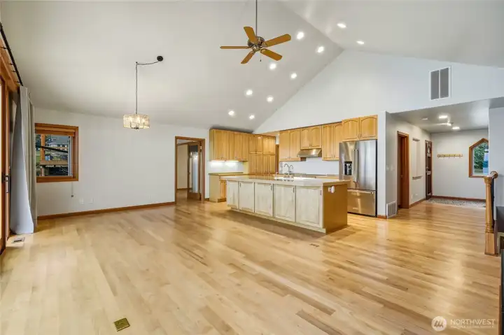 Gourmet kitchen w/ custom cabinetry, Island & new appliances.