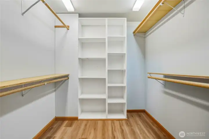 Attached walk in closet w/built in cabinets.