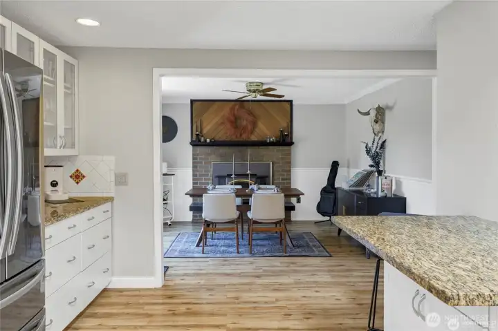 Kitchen opens up to large dining room