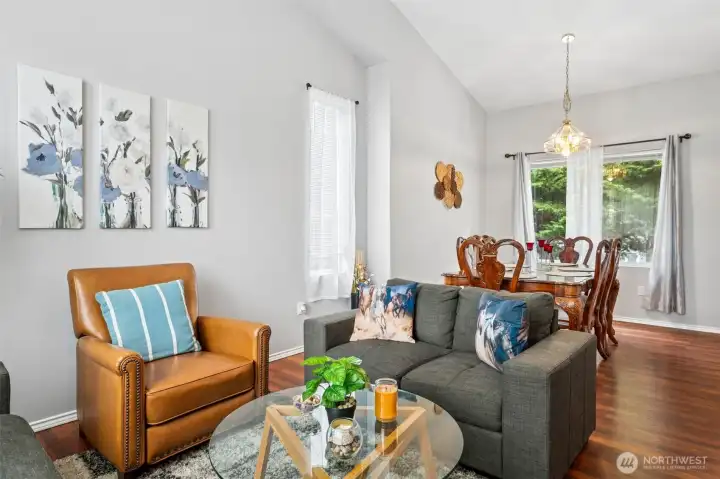 Front living room flows into the formal dining room.
