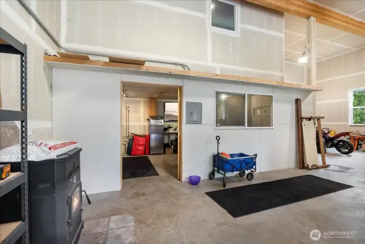 Private work shop and laundry room with french doors.