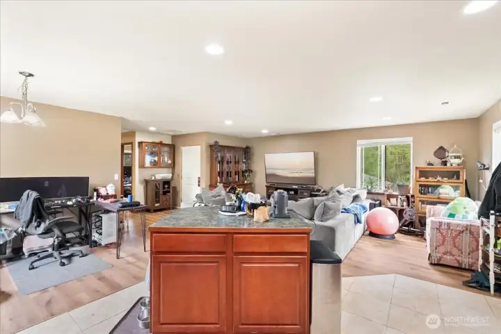 Large kitchen Island with storage and room for eating.