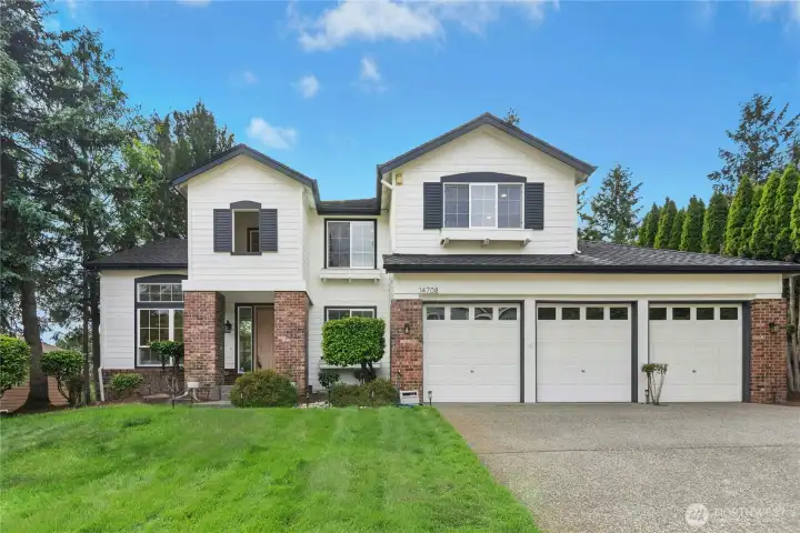 Welcome to this beautifully updated former model home in Silver Firs
