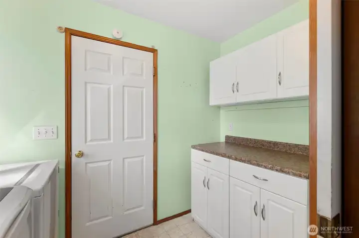 Ooohhh! Storage and a counter to fold the clothes! Don't you love it!?