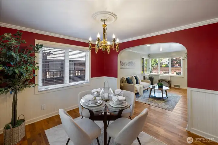 Charming dining room with views of the backyard.