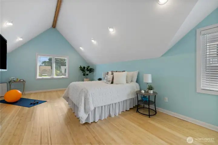 Expansive primary bedroom upstairs.