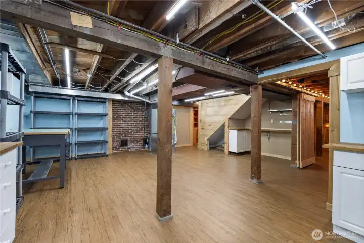 More great basement space.  Workbench and storage shelves included!  Bring your hobbies!