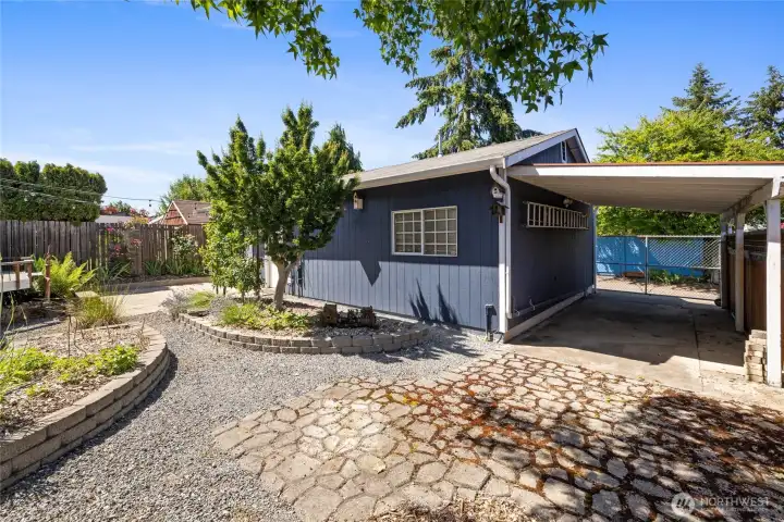 Carport attached to garage.
