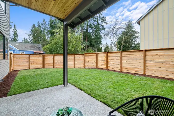 Photo from similar sister home by Ava Homes llc.  11340 residence will have covered porch, large deck, and large fenced side yard.