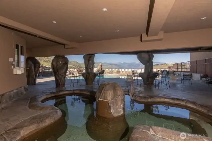 Covered hot tub area offers another spot for relaxation and peacefulness. Covered hot tub area offers another spot for relaxation and peacefulness.