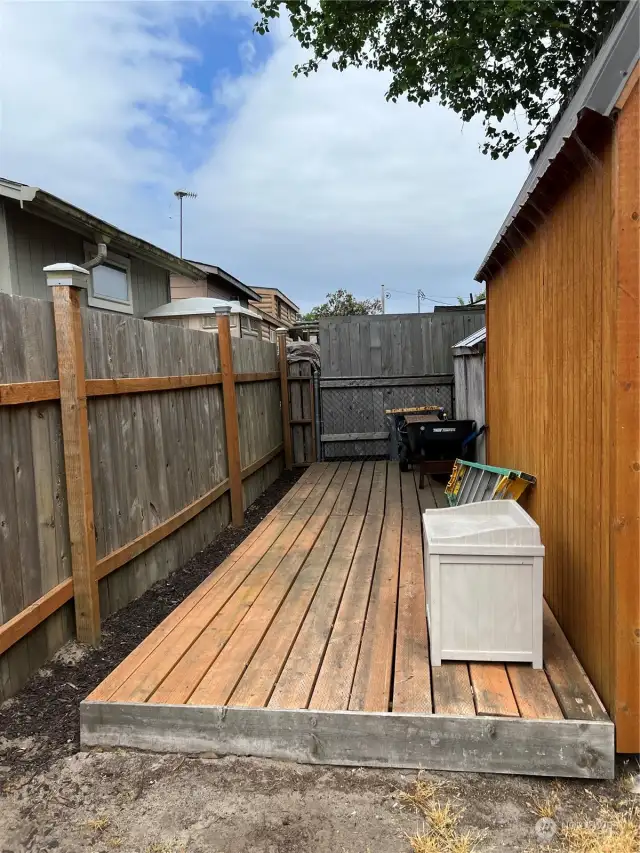 Deck off the storage shed for additional gear.