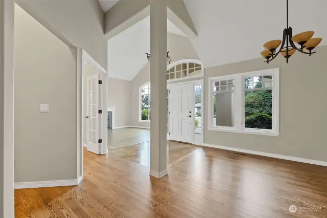 Living room & dining room separated with formal entry. Updated with hardwood flooring,finished in place, throughout.