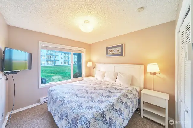 King bed and closet with shelving