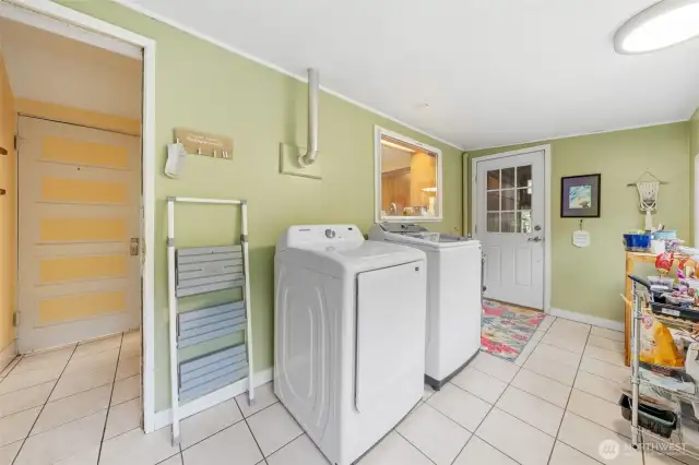 Laundry room conveniently placed.