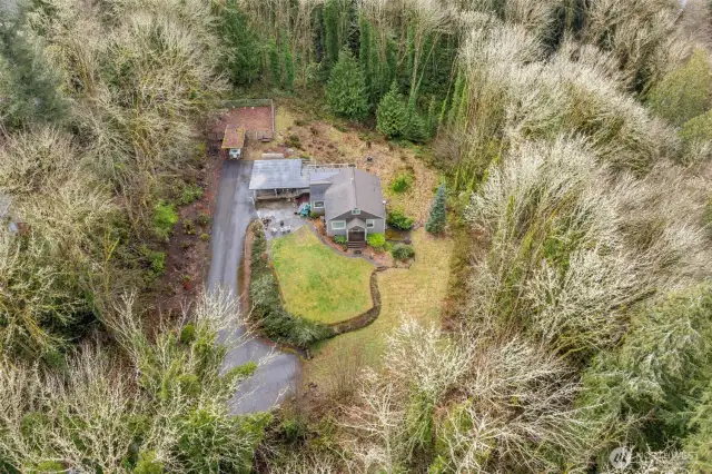 2 parcels & surrounded by forest.