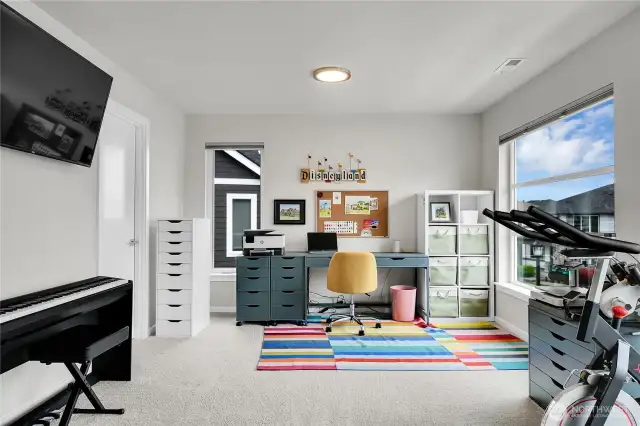 The other side of bedroom four which shows how large the room is, and how it could be used as a bonus room because of its size and location.