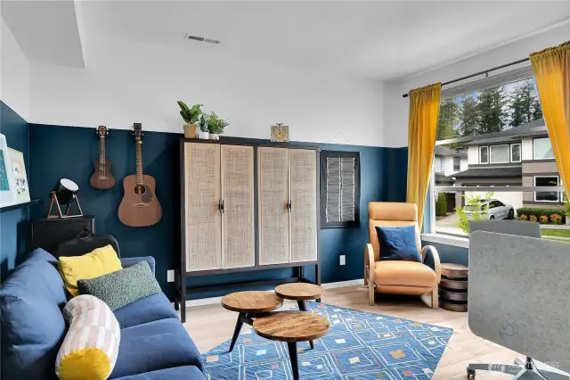 Off the light-filled entry area, to your immediate right, double glass doors open into the nice-sized home office or den.  An oversized front-facing window lets in natural light.