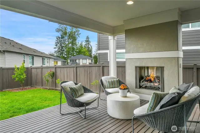 This incredible outdoor room is an extension of the indoor living area, and a lovely addition. The outdoor gas fireplace enhances this natural gathering space, adding not only warmth, but aesthetic appeal, ambience and value to this home. The fully fenced, flat, grassy backyard surrounds the deck and makes this outdoor room enjoyable day and night all throughout the year.