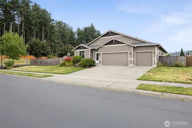 Located on large, fenced corner lot.